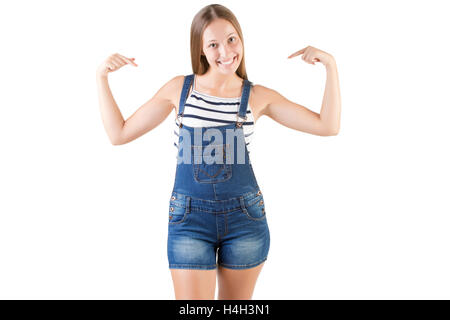 Glückliche Frau zeigt auf sich selbst isoliert in weiß Stockfoto