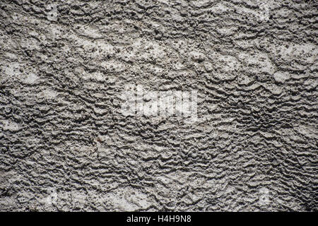 Abstrakt grau Textur, aufgenommen in der Nähe von Travertin Terrassen in Mammoth Hot Springs, Yellowstone-Nationalpark, USA Stockfoto