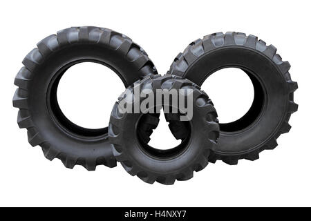 Drei Traktorreifen isoliert auf weißem Hintergrund Stockfoto