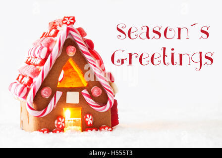 Lebkuchen Haus, weißer Hintergrund, Text Seasons Greetings Stockfoto