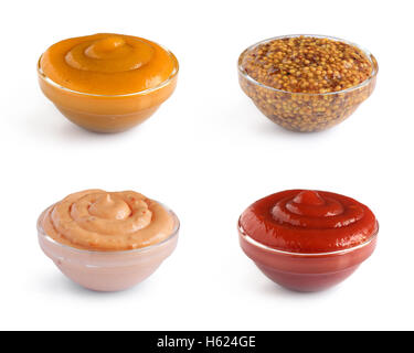 Sammlung von vier verschiedenen Saucen in Glas Schalen isolierten auf weißen Hintergrund Stockfoto