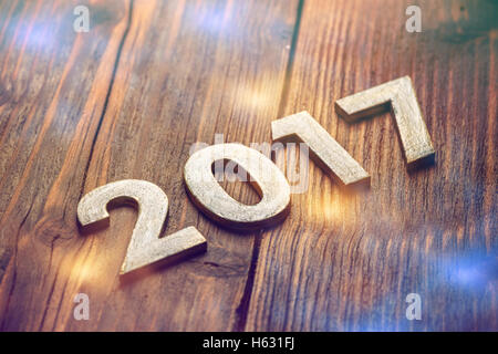 Glückliches Neujahr 2017 auf einem Vintage Holz-Hintergrund Stockfoto