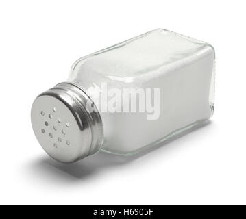 Glas Salzstreuer umgekippt isoliert auf weißem Hintergrund. Stockfoto