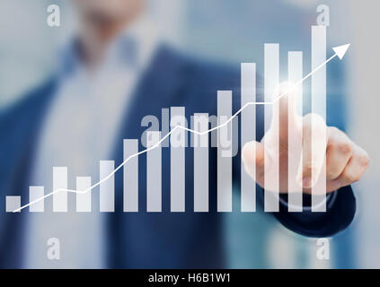 Geschäftserfolg mit wachsender, steigende Diagramme und Geschäftsmann im Hintergrund Stockfoto