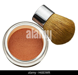 Glas Kosmetik Stiftung Pulver mit einer dicken weichen Bürste für den Einsatz in eine erhöhte konzeptuelle Ansicht von beau Stockfoto