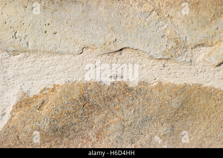 Nahaufnahme von einem Sand Farbe Stein Fliesen an der Wand Stockfoto