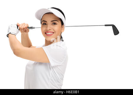 Fröhliche weiblichen Golfspieler schwingen eine Golf Schläger isolierten auf weißen Hintergrund Stockfoto