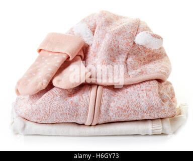 Haufen von rosa Baby-Kleidung isoliert auf weißem Hintergrund Stockfoto