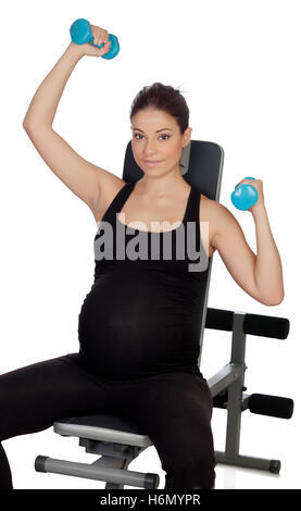 Schwangere Frau Heben von Gewichten isoliert auf weißem Hintergrund Stockfoto