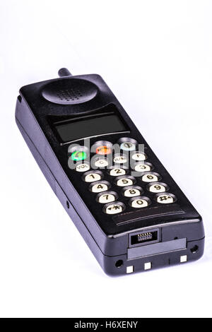 Alten altmodischen schwarz Vintage mobile Backstein Telefon gelegt auf weißem Hintergrund Stockfoto