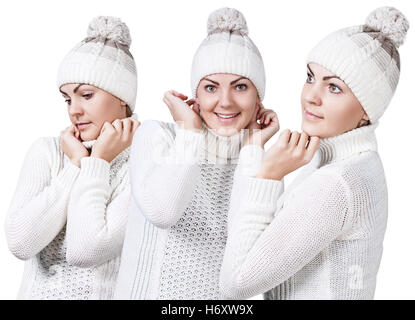 Frau im weißen Pullover und Mütze Stockfoto