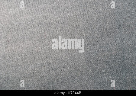 Nahaufnahme eines grauen Jeans Hintergrund Stockfoto