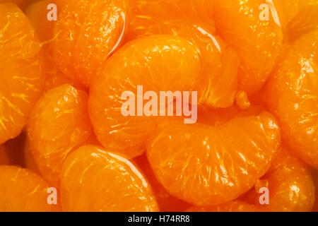 Detail der Mandarin Segmente im hellen Sirup. Stockfoto