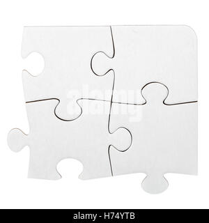 4 Karton Puzzlestücke, die isoliert auf weiss Stockfoto