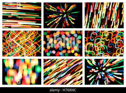 Set mit bunten Lichtflecken vor schwarzem Hintergrund Stockfoto
