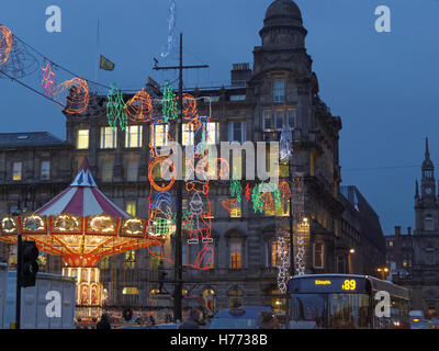 Glasgow liebt Weihnachten feier George Square leuchten Eislaufen party Dekorationen glasgow Weihnachtsmarkt Stockfoto