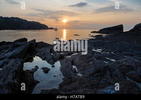 Sonnenuntergang über der Bucht bei Combe Martin, Devon Stockfoto