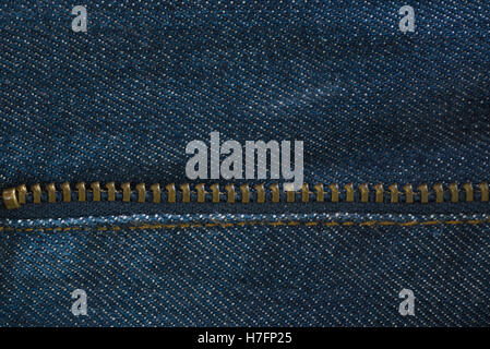 Blue-Denim-Jeans-Textur mit Reißverschluss, Textil-Hintergrund Stockfoto