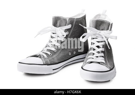 No-Name graue Sneakers isoliert auf weißem Hintergrund Stockfoto