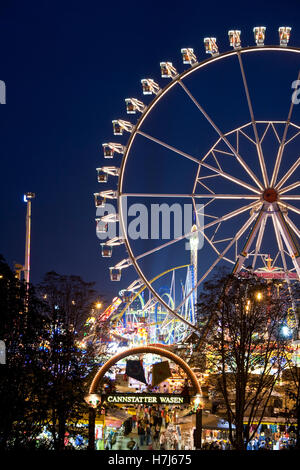 Riesenrad auf das Cannstatter Volksfest in der Nacht, Amusement rides, Cannstatter Volksfest, Stuttgart, Baden-Württemberg Stockfoto