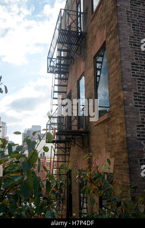 New York Feuerleitern in Chelsea Village auf der Westseite von Manhattan Stockfoto