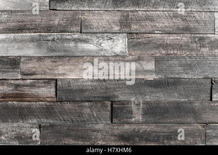 Nahaufnahme der Mauer aus Holzbohlen Holzstruktur Hintergrund alte Platten gemacht. Stockfoto