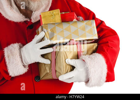 Santa Claus holding ein Geschenke Stockfoto