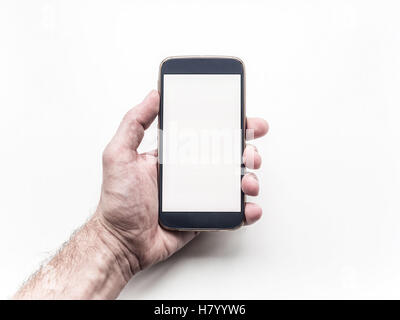 Mannes hand halten und mit mobile Smartphone auf weißem Hintergrund Stockfoto