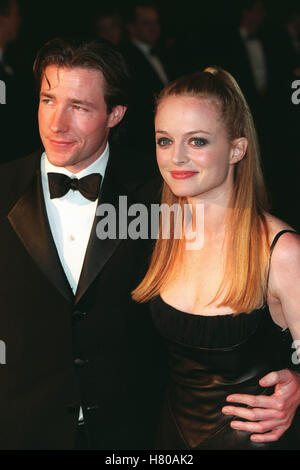 ED BURNS & HEATHER GRAHAM LOS ANGELES USA 25. März 1999 Stockfoto