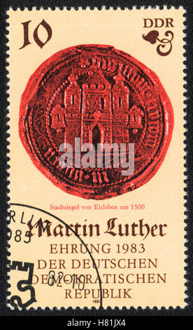 Die Briefmarke gedruckt in DDR Deutschland zeigt Stadtsiegel von Eisleben, ca. 1983 Stockfoto