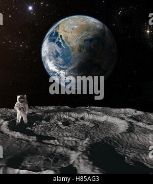 Der Astronaut auf dem Mond mit der Erde im Hintergrund Stockfoto