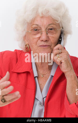 Ältere Frau mit Handy Stockfoto