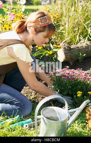 Frau im Garten Stockfoto