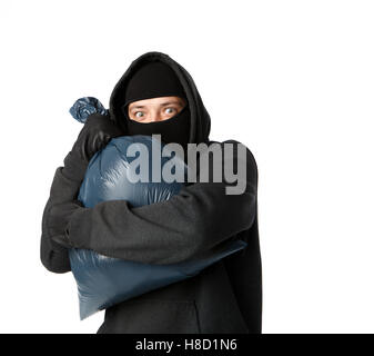 Schreckliche Straßenräuber halten große Tasche Stockfoto