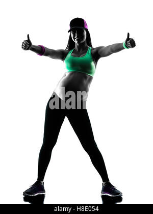 eine kaukasische schwangere Frau, die Ausübung von Fitness-Übungen in Silhouette Studio isoliert auf weißem Hintergrund Stockfoto