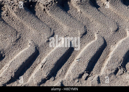 Fußspuren im Sand LKW Stockfoto