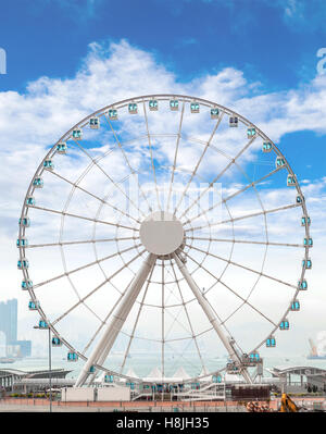 Hong Kong Riesenrad ist ein 197 ft hohen Riesenrad mit Blick auf Victoria Harbour in Hongkong. Stockfoto