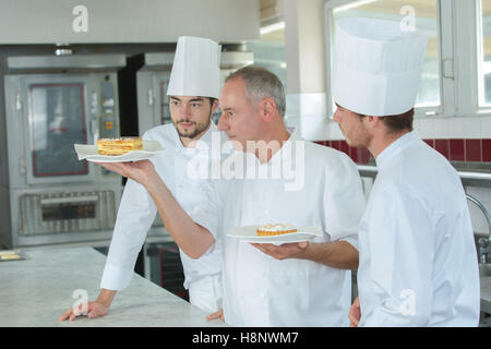 drei Köche am besten ihre Arbeit Stockfoto