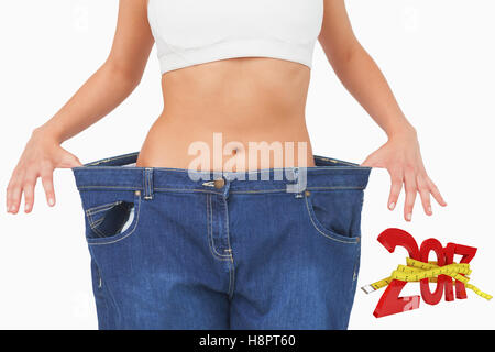 Zusammengesetztes Bild digital erzeugte Bild des neuen Jahres mit Maßband Stockfoto