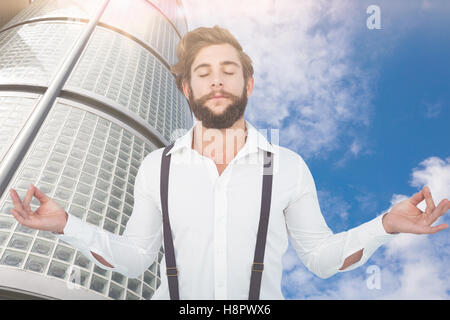 Zusammengesetztes Bild Hipster meditieren ausgestreckte Armen Stockfoto