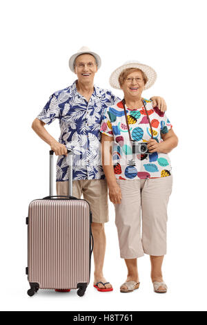 In voller Länge Portrait von ältere Touristen mit einem Koffer isoliert auf weißem Hintergrund Stockfoto