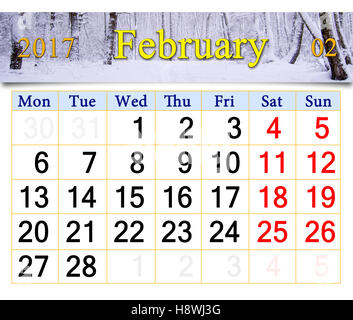 schöne Kalender für Februar 2017 mit verschneiten Birkenhain Stockfoto