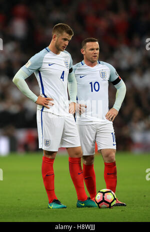 (links-rechts) Eric Dier und Wayne Rooney während der FIFA WM 2018 Gruppe F-Qualifikationsspiel im Wembley Stadium, London England. Stockfoto