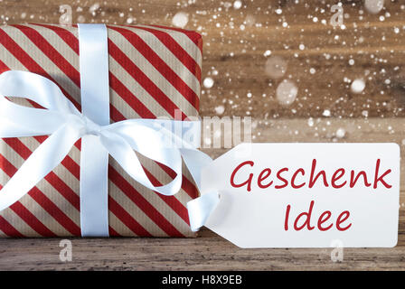 Vorliegenden Text meistverkauftes Idee bedeutet mit Schneeflocken, Geschenk-Idee Stockfoto