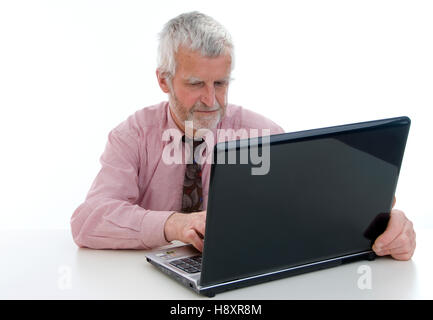 Senioren, 60 +, arbeitet an einem laptop Stockfoto