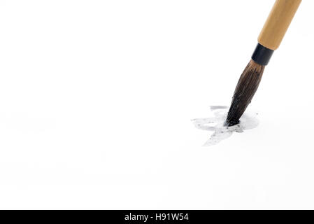 Chinesische Pinsel auf Whitepapers Stockfoto