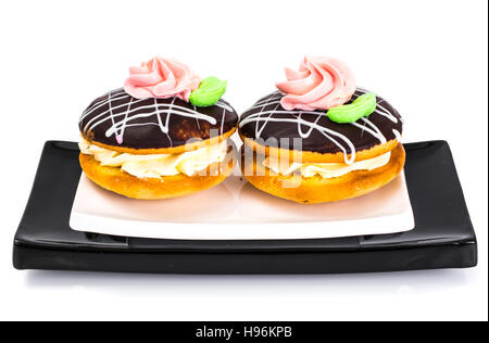 Bunte Kekse Kuchen Busch mit Sahnehäubchen und Creme-Füllung. Studio Photo Stockfoto