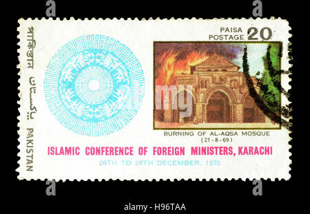 Storniert Briefmarke durch Pakistan gedruckt, zeigt, dass Konferenz Crest und Verbrennung von Alaqsa Moschee, circa 1970. Stockfoto