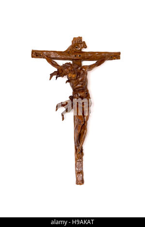 Hölzerne Jesus am Kreuz mit Beschneidungspfad Stockfoto