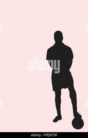 Zusammengesetztes Bild Porträt des Sserious-Football-Spieler in blau stehend mit dem ball Stockfoto